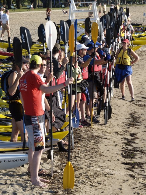 A line of kayakers getting ready for Kayak for a Cause.