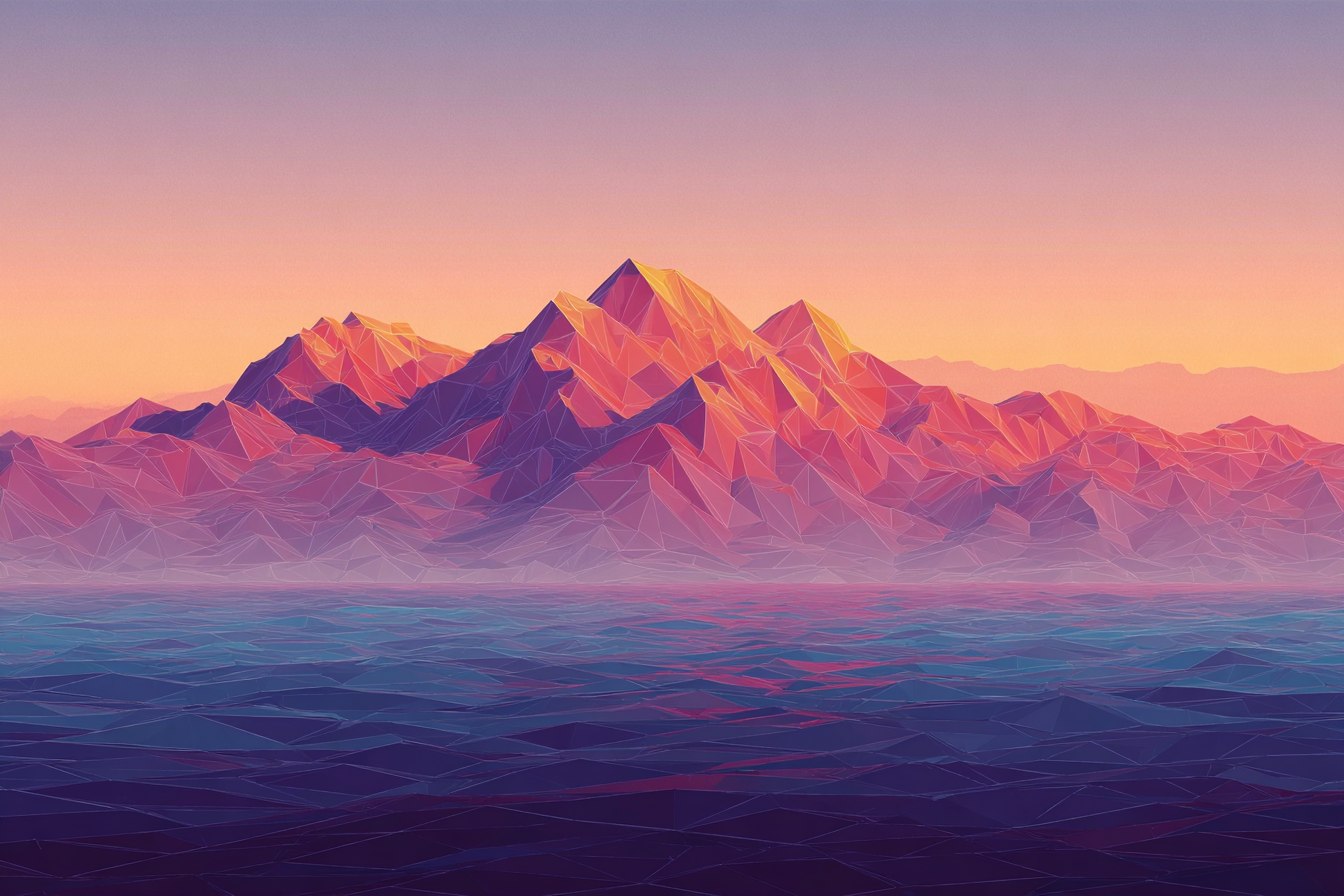 A mountain range in front of an ocean.